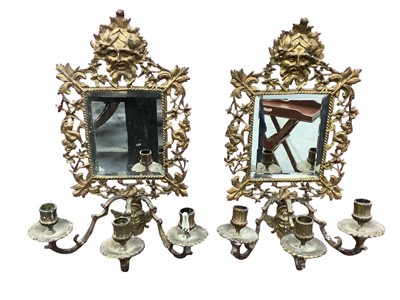 Lot 1687 - Pair of late Victorian cast brass girandole wall mirrors