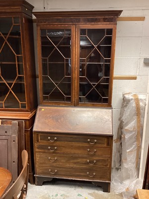 Lot 1296 - Edwardian Mahogany bureau bookcase, the sloping fall above four graduated crossbanded drawers.