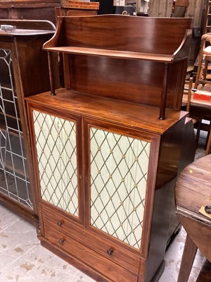 Lot 1277 - Two door Regency chiffonier with brass grill doors above two drawers, the ledge back supported by two gun barrel supports