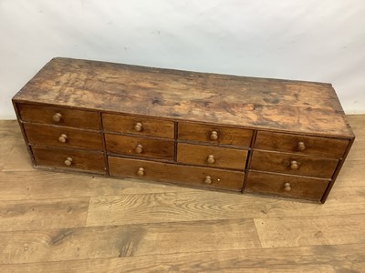 Lot 1581 - Antique pine bank of drawers