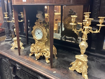 Lot 696 - Gilt mantel clock with gilt candelabra together with pendulum and key