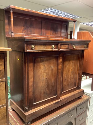 Lot 1286 - Mahogany Regency period two door chiffonier with two central drawers and shelf back