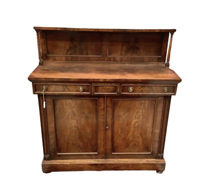 Lot 1680 - Regency mahogany two door chiffonier with two central drawers and shelf back