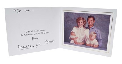 Lot 15 - T.R.H. The Prince and Princess of Wales, signed 1984 Christmas card, with twin gilt ciphers to cover, colour photograph of the happy couple with the infant Prince Harry and young Prince William