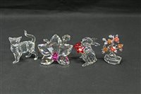 Lot 2196 - Four Swarovski crystal boxed ornaments - to...