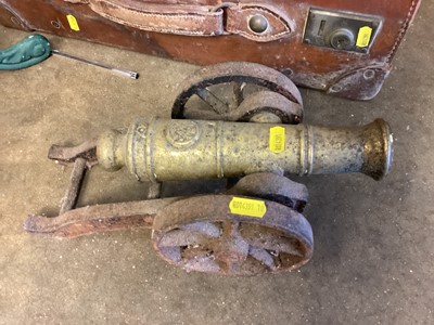 Lot 812 - Old brass and iron model cannon, antique telescope, George III tea caddy, model of a fragment of a classical hand, and an old leather suitcase