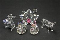 Lot 2197 - Four Swarovski crystal boxed ornaments - to...