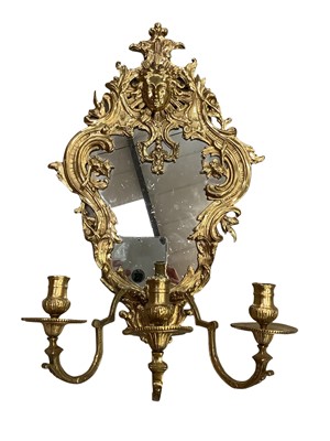 Lot 1694 - Rococo style gilt metal wall sconce