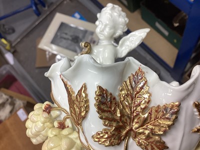 Lot 104 - Two similar late 19th century Moore Bros. porcelain sweetmeat baskets decorated with cherubs and gilt ornament, Greek Key pattern to footrims, stamped and impressed marks, 16.5cm high