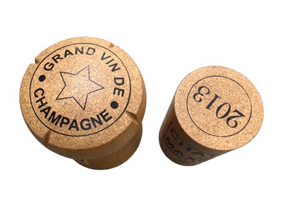 Lot 425 - Two novelty stools in the form of a champagne cork, 49cm high and a wine cork 43.5cm high