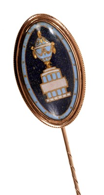 Lot 768 - George III gold and enamel mourning stick pin with gold pale blue and white urn on a royal blue enamel ground in engraved gold mount.