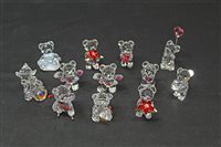 Lot 2213 - Group of twelve Swarovski crystal bears -...