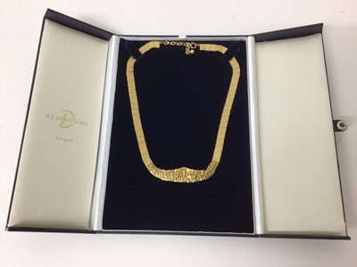 Lot 15 - 9ct gold Cleopatra style fringe necklace
