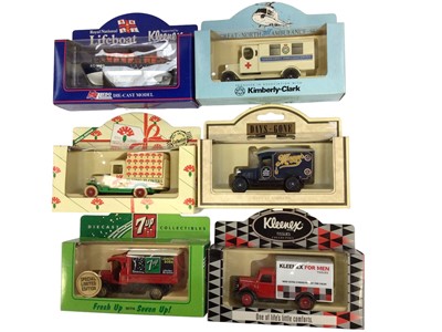 Lot 1896 - Die Cast collection of Llado, Corgi, boxed models in three boxes together with glazed display cabinets.