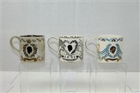 Lot 2216 - Three Wedgwood commemorative mugs designed by...