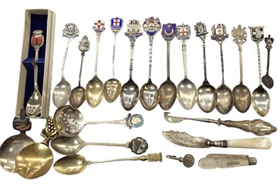 Lot 1054 - Group of mainly silver souvenir spoons, some plated, silver handled button hook, silver and mother of pearl fruit knife and butter knife and a silver napkin hook