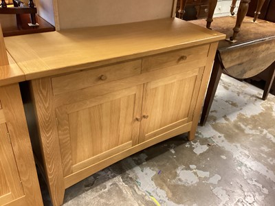 Lot 1264 - Mark Elliot light oak sideboard with two drawers and two panelled doors below, 121cm wide, 48cm deep, 87.5cm high