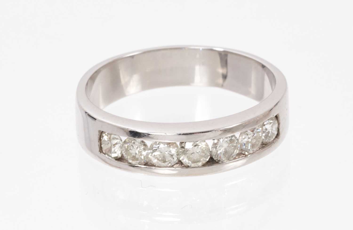 Lot 825 - Diamond half eternity ring