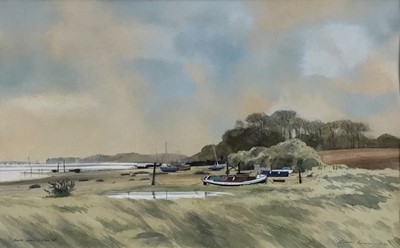 Lot 90 - Michael Norman watercolour - Boats lying below Freston Hill, signed and dated 1990, 28.5cm x 45.5cm in glazed frame