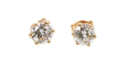 Lot 707 - Pair diamond single stone stud earrings, each with a brilliant cut diamond estimated to weigh approximately 0.50 carats each.