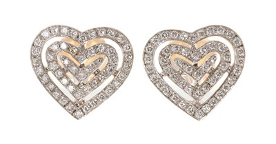 Lot 708 - Pair of diamond heart shape earrings by Theo Fennell