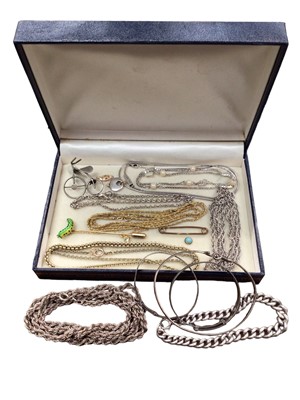 Lot 1061 - Group of silver chains, silver curb link bracelet, three silver bangles and other jewellery