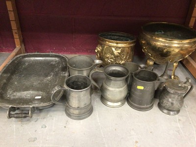 Lot 748 - Two brass jardinières and a group of antique pewter, including a meat dish, tankards and a wine funnel