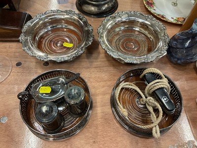 Lot 582 - Four silver plated wine coasters, together with other silver plated wares.