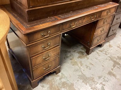 Lot 1285 - Georgian style mahogany twin pedestal desk with inset leather lined top and eight drawers below, 137cm wide, 68.5cm deep, 74.5cm high