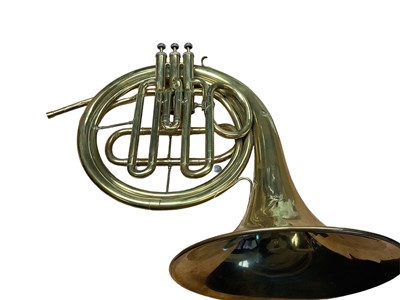 Lot 2218 - Brass French horn in case