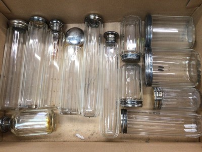 Lot 1073 - Group of mostly silver topped glass bottles and jars