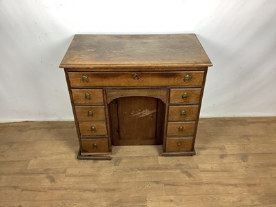 Lot 1576 - 18th century oak kneehole desk