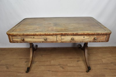 Lot 1571 - Regency mahogany and ebony line inlaid library table