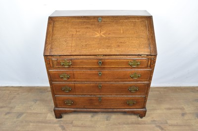 Lot 1566 - George III oak bureau