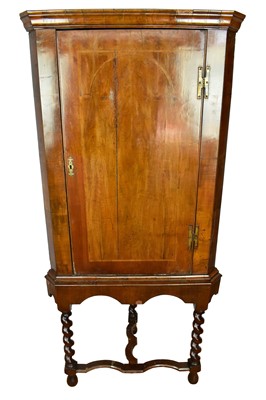 Lot 1561 - 18th century walnut corner cupboard on stand