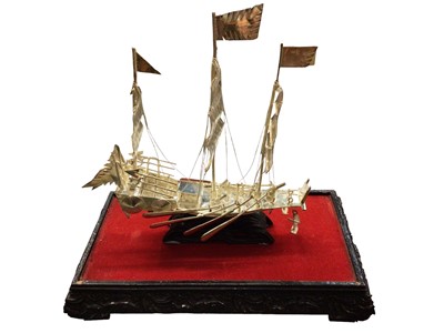 Lot 1101 - Chinese white metal model of a junk, in a glazed case, together with a Danish silver and blue enamel salt and spoon in box