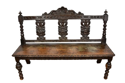 Lot 1574 - Victorian carved oak hall bench