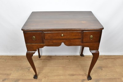 Lot 1573 - Mid 18th century oak lowboy