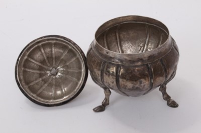 Lot 507 - Continental silver sucrier of cauldron form, raised on three hoof feet, with slip in cover