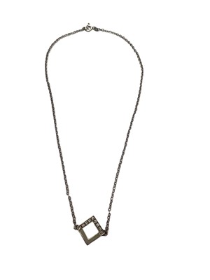 Lot 1081 - 18ct white gold diamond set square shaped pendant on a replacement silver chain, 40cm long