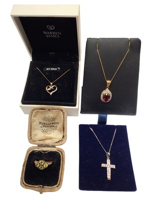 Lot 1082 - Two 9ct gold diamond set pendants on 9ct gold chains, 9ct white gold synthetic stone cross pendant on 9ct white gold chain and an antique style 9ct gold gem set ring