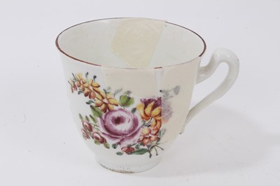 Lot 211 - A Chelsea chocolate or large coffee cup, circa 1755, painted with flowers, with red-lined rim, anchor mark to base, 7cm high