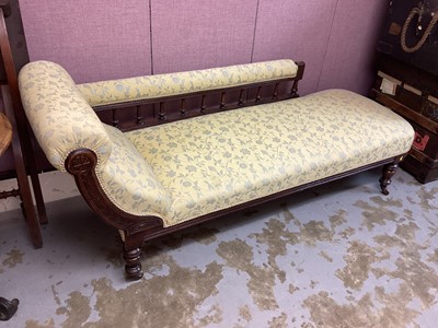 Lot 1315 - Late Victorian chaise longue with yellow upholstery on turned legs and castors