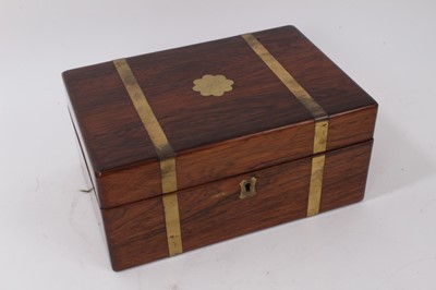 Lot 995 - 19th century brass bound rosewood writing box with fitted interior, containing three white metal topped glass jars