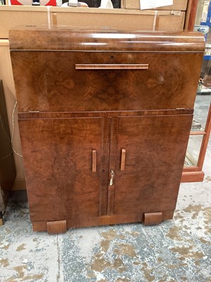 Lot 1349 - Art deco walnut veneered drinks cabinet with rising lid and fall front and two doors below, 91.5cm wide, 45.5cm deep, 119.5cm high