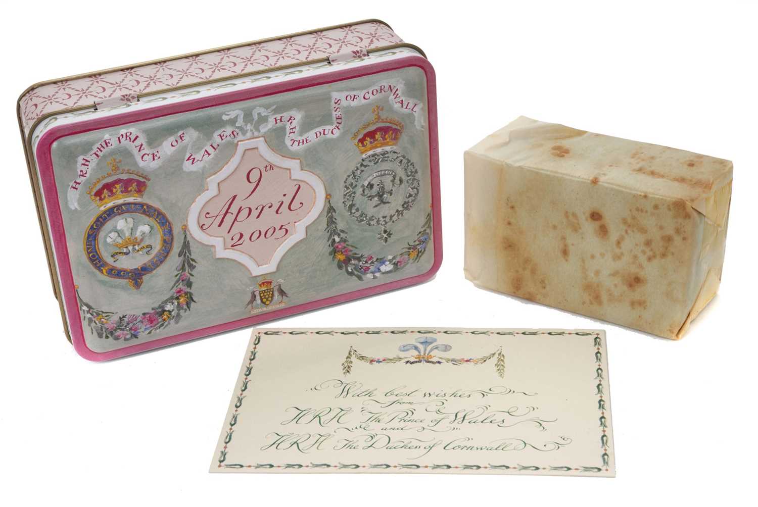 Lot 38 - The Wedding of T.R.H. The Prince of Wales to The Duchess of Cornwall (now T.M King Charles III and Queen Camilla) 9th April 2005, piece of Wedding cake in original presentation tin with card and o...