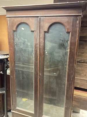 Lot 1379 - Oak bookcase with two arched glazed doors and two inlaid panelled doors below, 88.5cm wide, 36cm deep, 186cm high