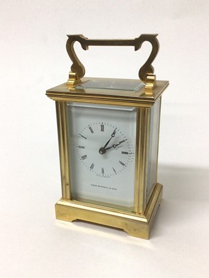 Lot 20 - A Thomas Russell & Son brass cased carriage clock with key