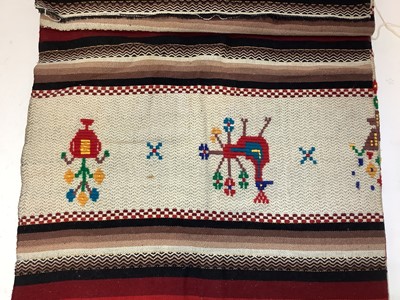 Lot 2069 - A selection of vintage textiles including South American hand woven rug with peacocks, boxed table linens and other table cloths, silk and boxed handkerchiefs etc.