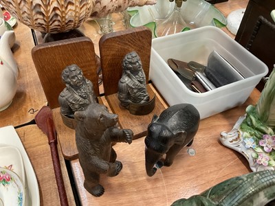 Lot 607 - Black Forest carved wood model of a bear together with bookends, glasses and a carved elephant.